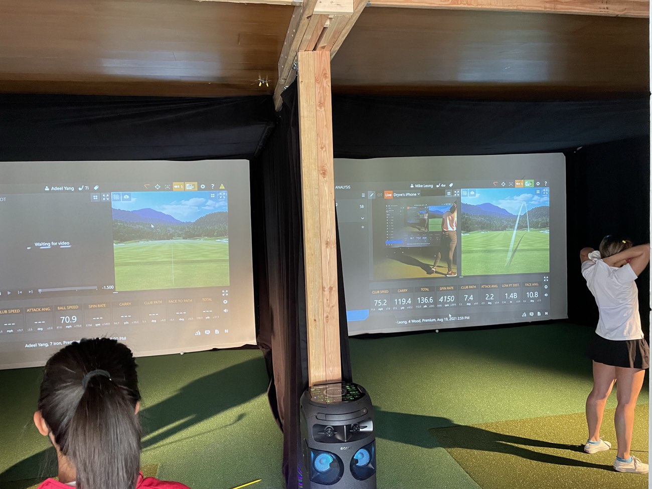 The two indoor TrackMan golf simulator bays at Lincoln Park Golf Course